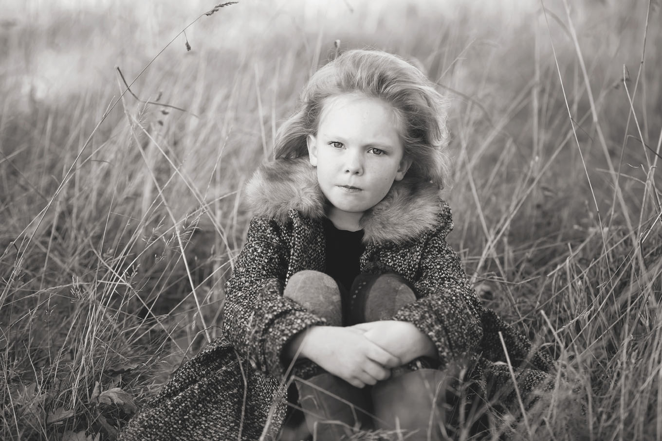 Autumnal outdoor portrait of a little girl
